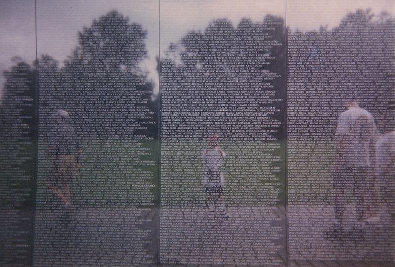 Vietnam Veterans Memorial Self-Portrait — Washington, DC (1997). Color photograph by Jeff Pearson.