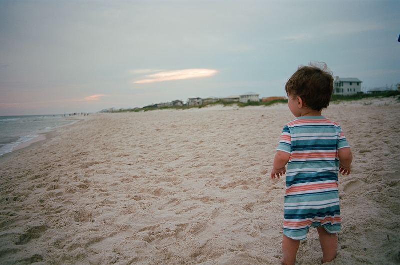 First Time at the Beach — Gulf Shores, Alabama. Color photograph by Jeff Pearson.